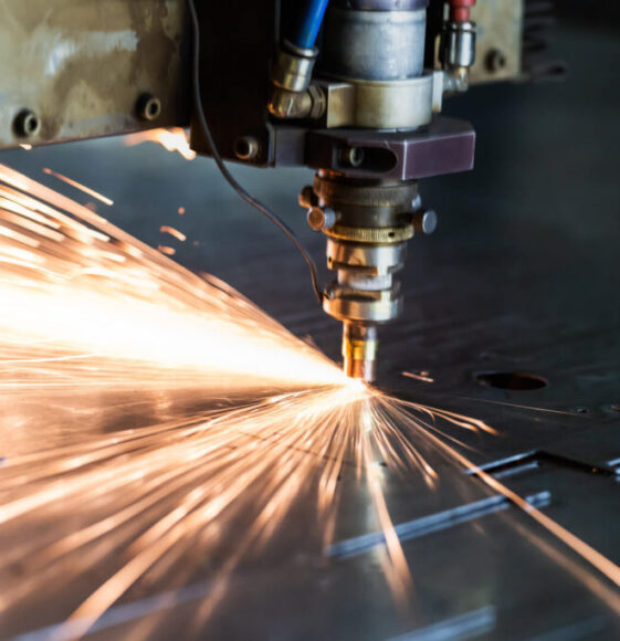 laser-cutting-process-with-a-sheaf-of-sparks-and-motion-blur-of-head-unit-while-piercing-through-zinc_t20_z3np64 (1)